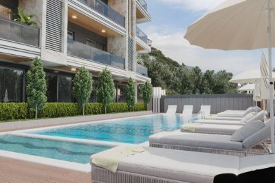 Novostavba apartmánov na predaj v centre Alanye, 900 m pláž Kleopatra  APM