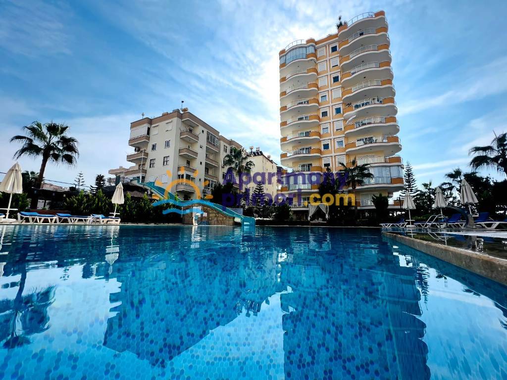 Zariadený byt s výhľadom na more na predaj Mahmutlar Alanya APM